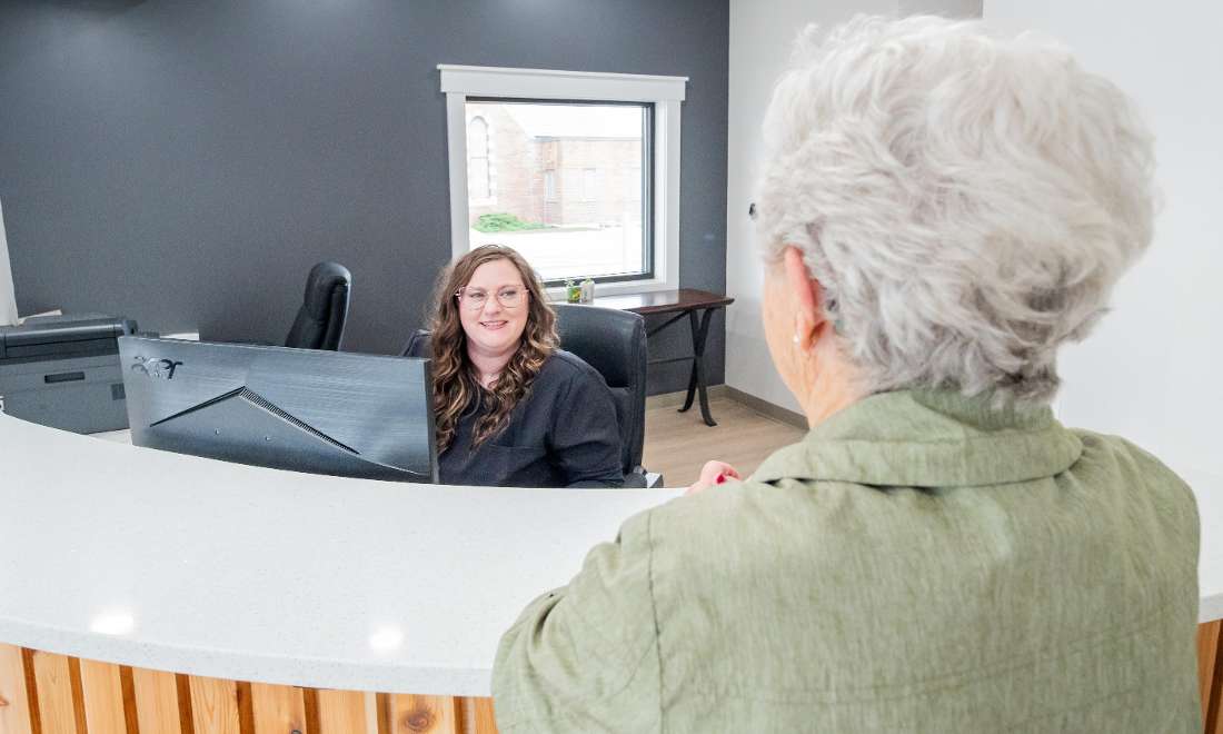 patient checking in for dental appointment 